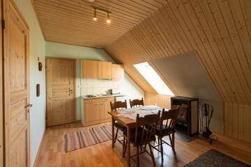Фото номера Четырехместный номер Кемпинги Vetsi Talli Holiday Village г. Kassari 3
