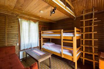 Фото номера Трехместный номер, вид на сад Кемпинги Vetsi Talli Holiday Village г. Kassari 4